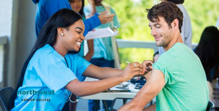 Medical Assistant helping patient