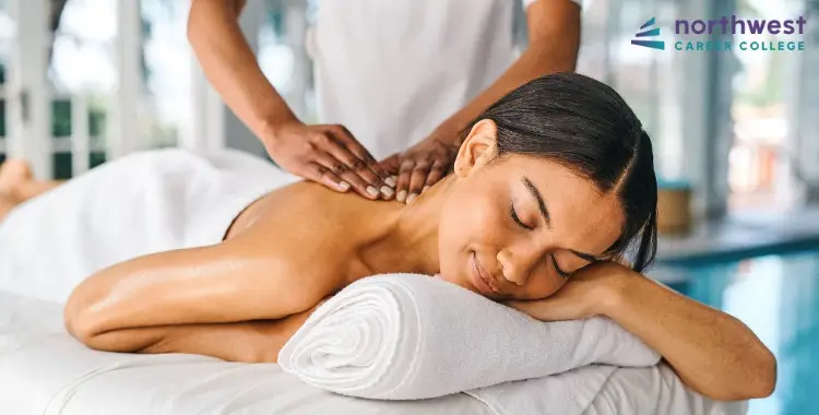 A massage therapist provides a relaxing treatment, highlighting the Massage Therapy Profession at Northwest Career College.