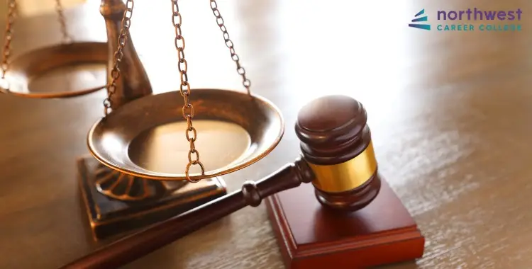 Scales of justice and a gavel represent legal themes; raises the question, Is a Criminal Justice Program Expensive?