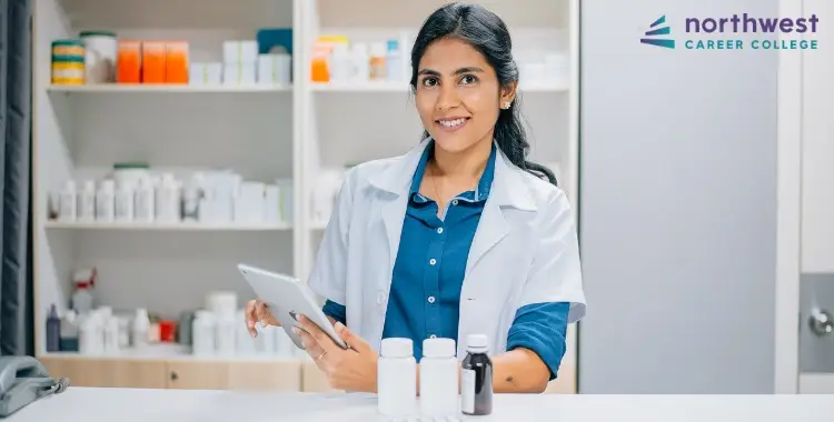 A pharmacist using a tablet in a pharmacy, showcasing the role of technology in the pharmacy.