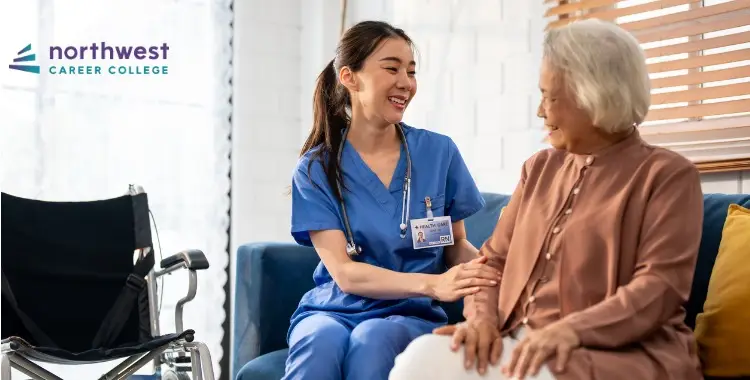 A medical assistant interacts warmly with an elderly woman, highlighting the role of Medical Assistant vs Nurse in care.