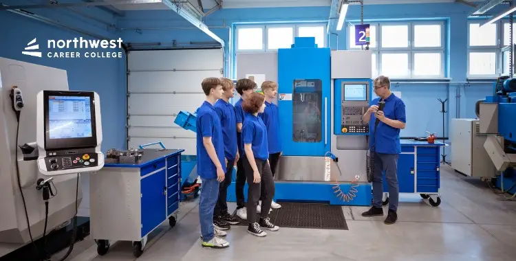 Students learn about machinery in a workshop, exploring hands-on skills for a Trade Career at Northwest Career College.